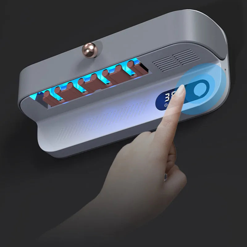 White wall-mounted smart toothbrush sterilizer with UV light and USB charging port