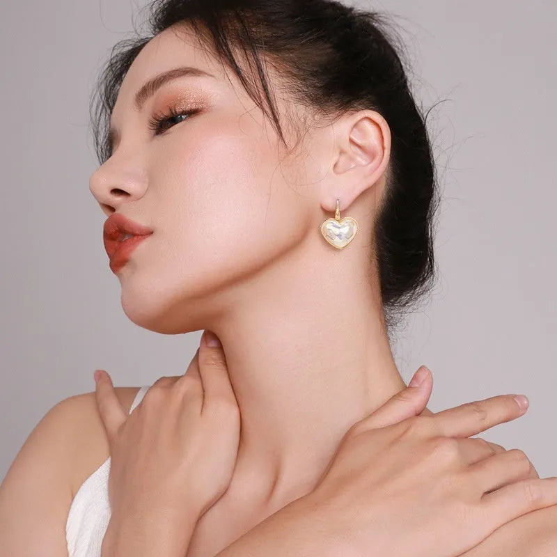 Gold colour alloy clip-on earrings for women with natural summer style