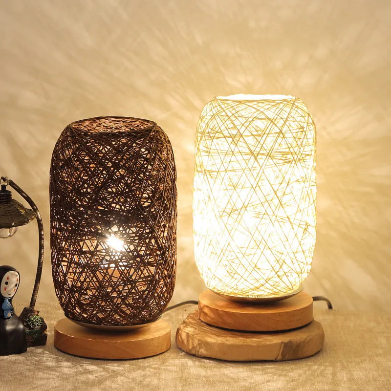 Sepak Takraw ball design desk lamp made of brown hemp rope and wood with a warm LED light.
