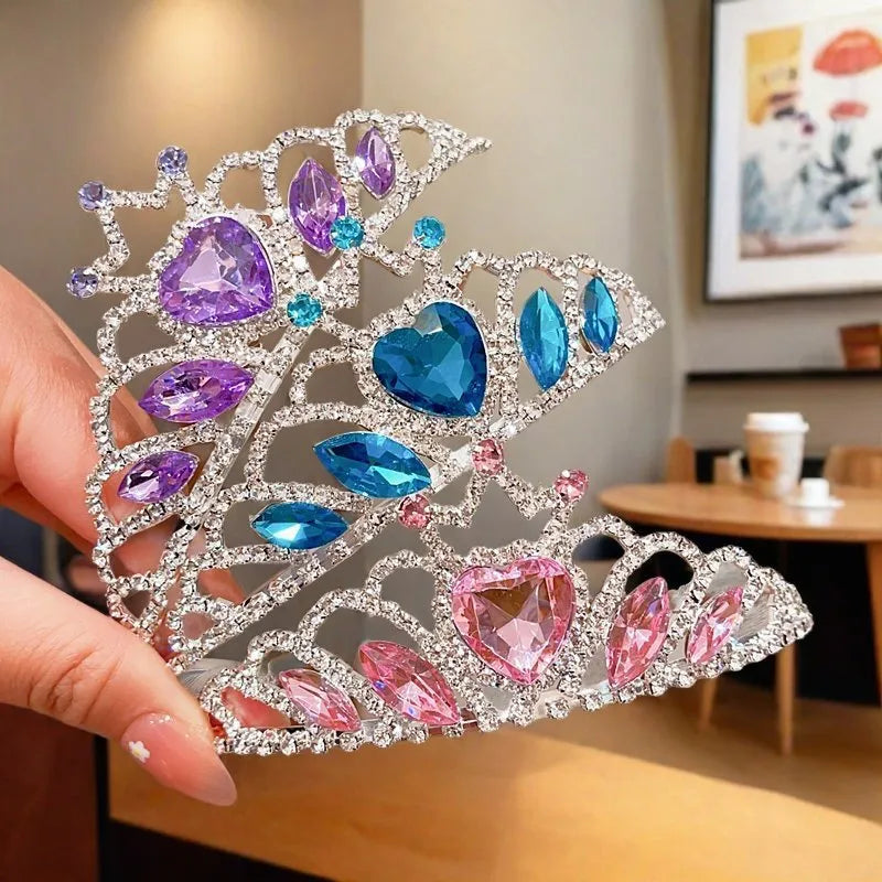 Children's electroplated alloy crown headband headdress in pink, light blue, and light purple crystal colours.