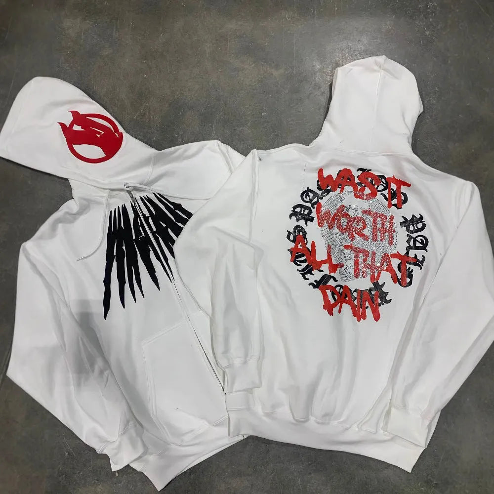Black loose hooded sweatshirt with white printed skull pattern and rhinestone details on front