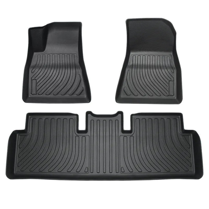Rubber floor mats with TPE footrests designed for Tesla Model 3, Y, S, and X vehicles.