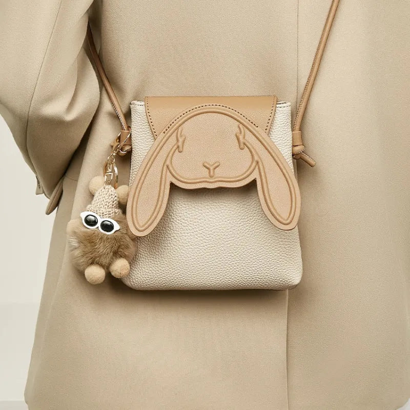 coffee colour crossbody phone bag with pom-pom pendant PU material vertical square shape open pockets
