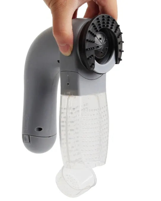 Grey portable pet hair removal vacuum with soft rubber head and large collection canister