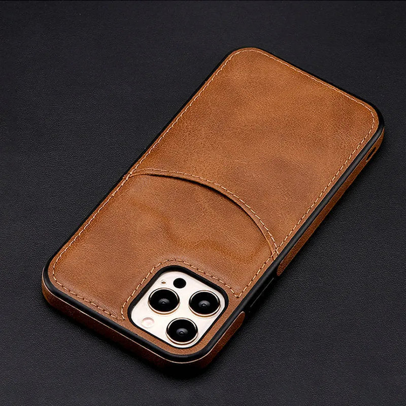 Dark blue PU leather protective phone case for iPhone on a table.