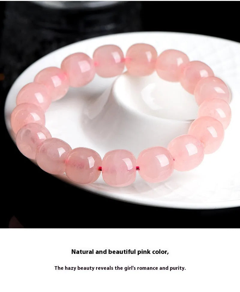 Pink crystal barrel bead bracelet with geometric design and 8 x 10mm beads