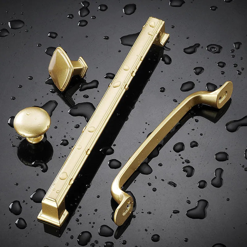 Gold T-shaped aluminium alloy single hole cabinet handle showing hole distance options.