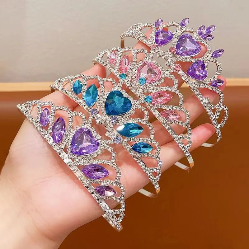 Children's electroplated alloy crown headband headdress in pink, light blue, and light purple crystal colours.