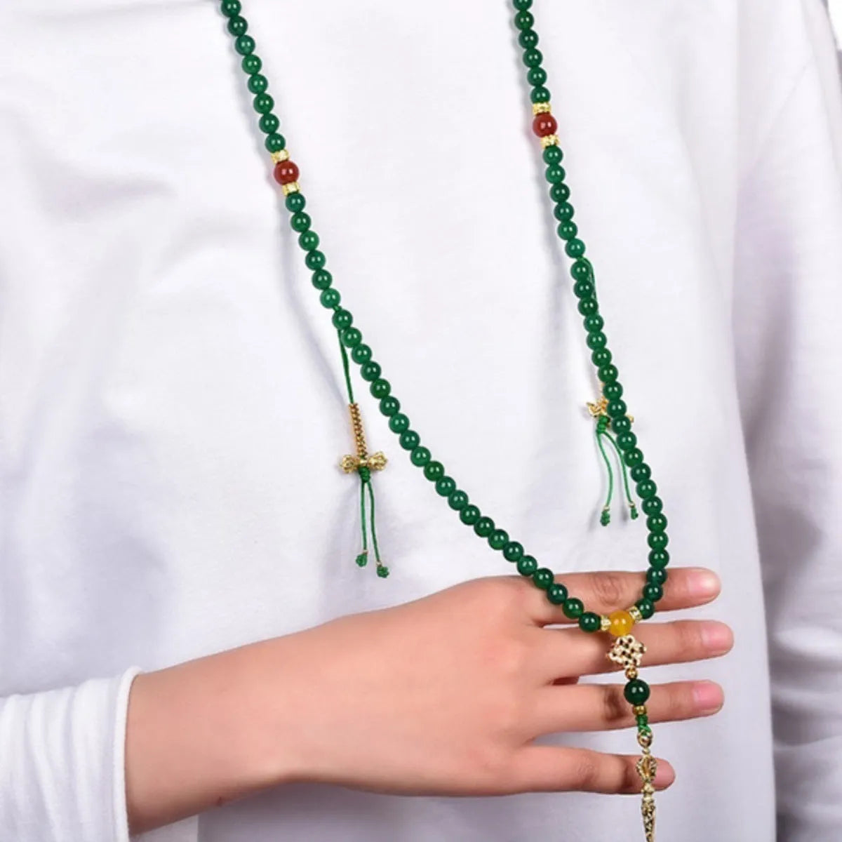 Natural green agate multi-circle bracelet on wrist, showing 8mm bead size.