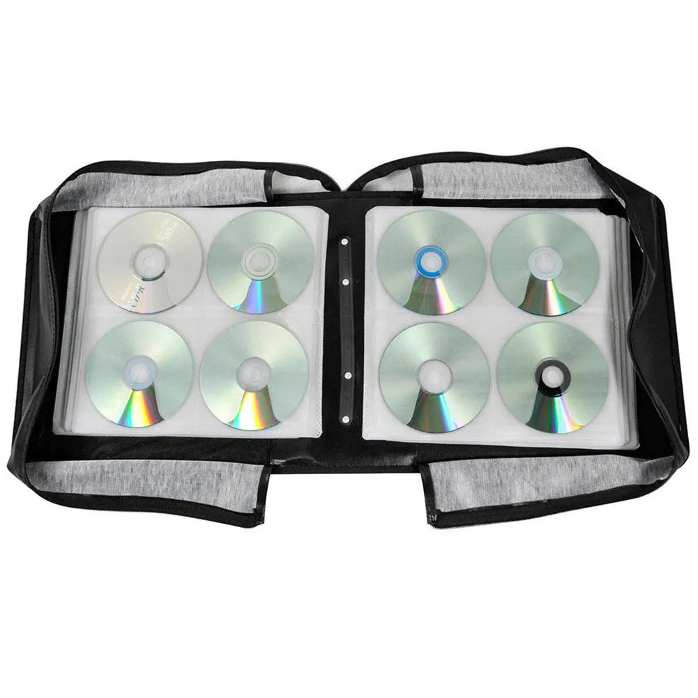 Black Oxford fabric CD DVD storage organiser case with a zipper and top hand strap, showing multiple disc sleeves inside.