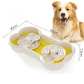 Large green slow feeder dog bowl with puzzle trays and non-slip suction cups.