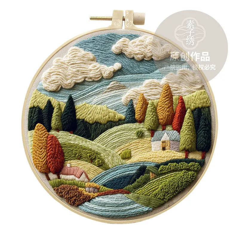 Embroidery DIY landscape kit with cotton fabric, bamboo frame, scissors, and thread for scenic designs