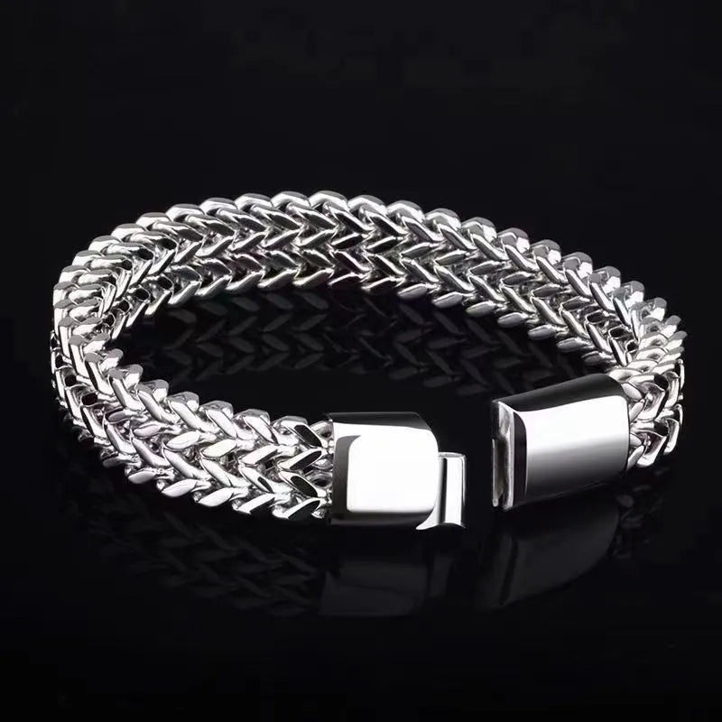 Geometric stainless steel bracelet showing front and back design in silver finish