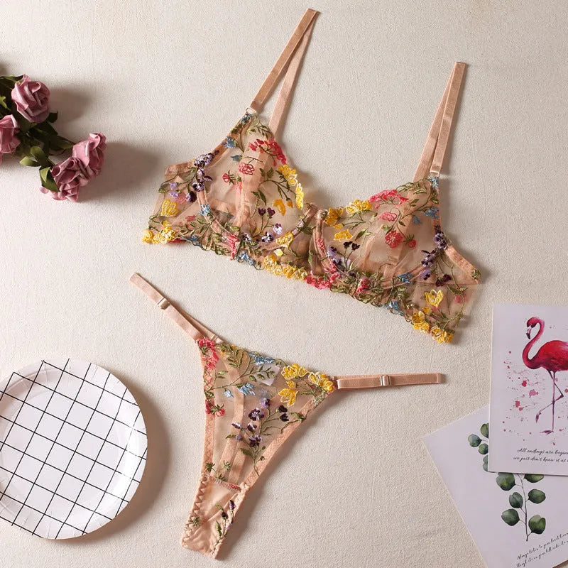 Floral pattern polyester mesh bra with steel ring T-back and matching brief in skin colour.