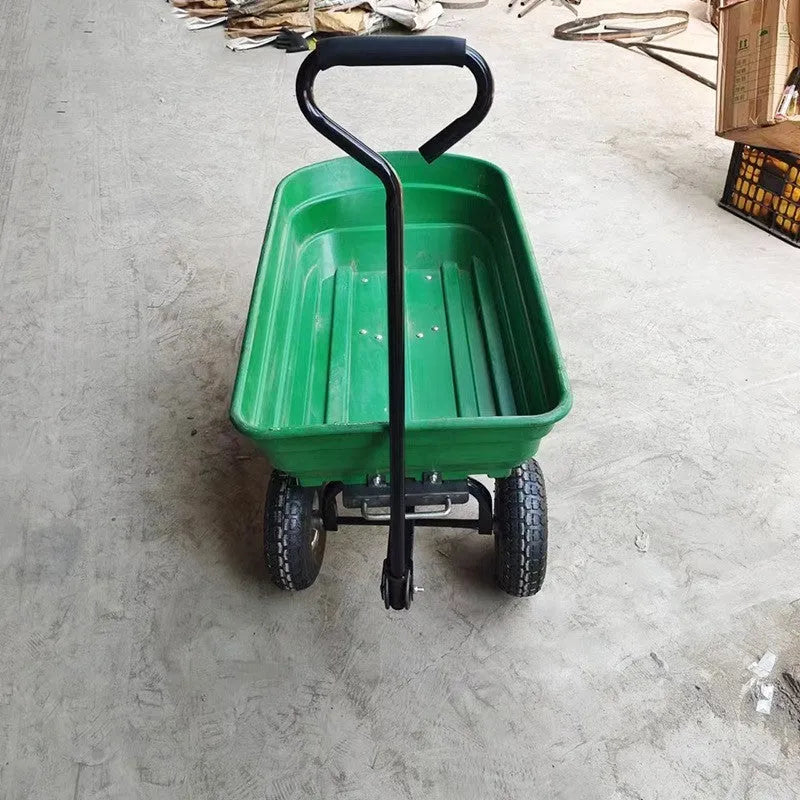 Green four-wheel plastic dumptruck with 350kg capacity for garden and construction use