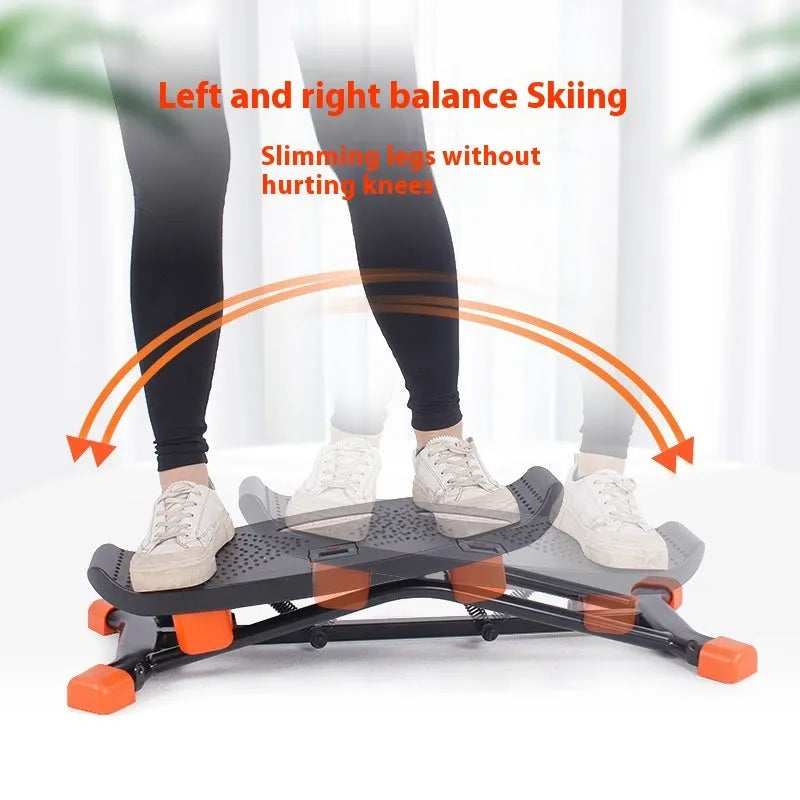 Black JS101A model mini indoor fitness skiing machine with elastic hand straps.