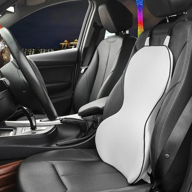 Solid-colour memory foam car lumbar support cushion on a car seat.