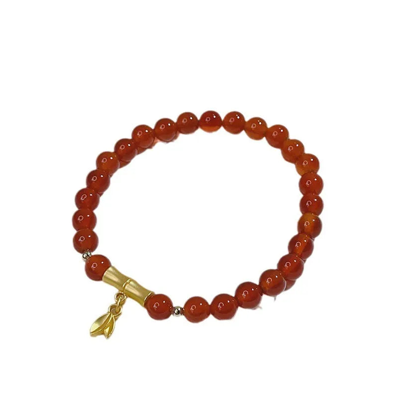 Red agate bracelet for women with dragon motifs and traditional Chinese lucky charms