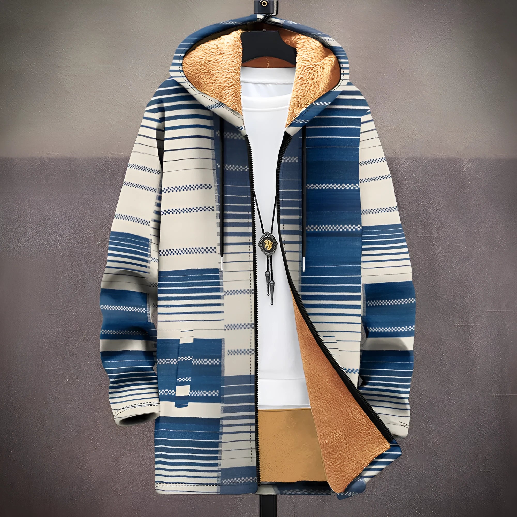 Man wearing a loose-fit zip-up hooded cardigan with a multicolour digital print pattern.