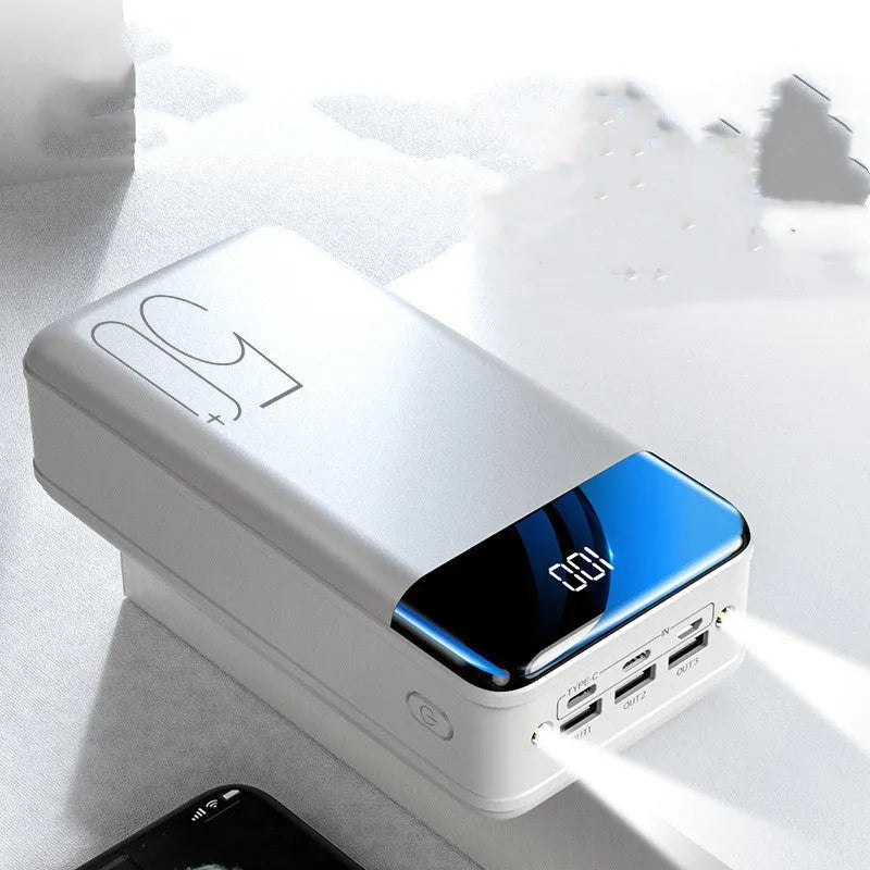 Large capacity 50000mAh power bank in black plastic case with three USB output ports
