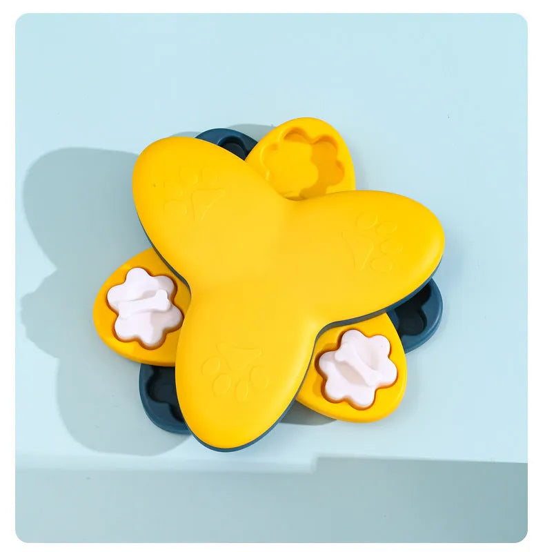 Green dog puzzle toy with bone-shaped lids and non-slip base for treat dispensing