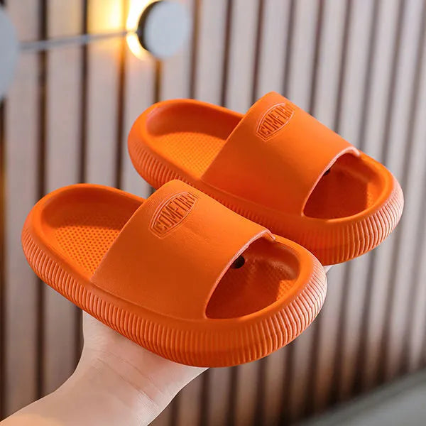 Children's EVA slippers in bright colours with non-slip soles, showing size options from 15.5cm to 21.5cm