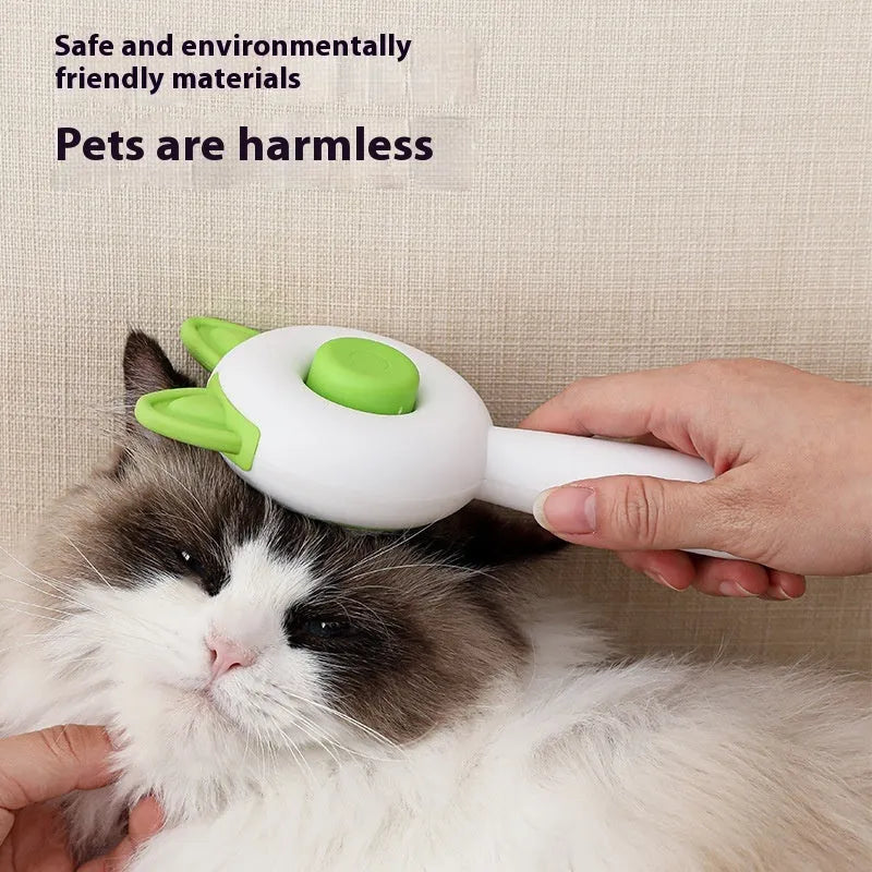 Circular greenish white pet grooming brush with stainless steel teeth and rubber massage nodules.
