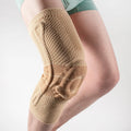 Black and blue adult sports knee pad made from nylon and spandex for running and basketball