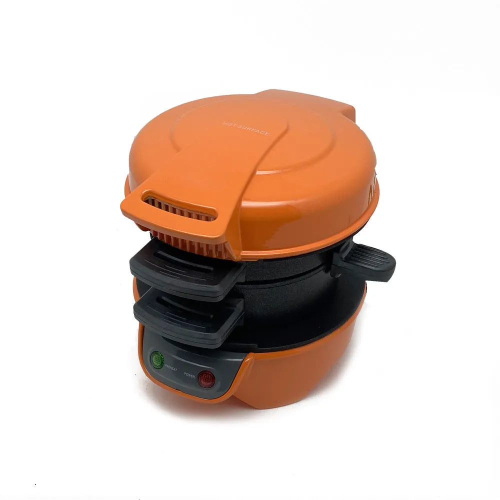 Bright red household breakfast machine sandwich maker with egg cooker ring and two baking trays.