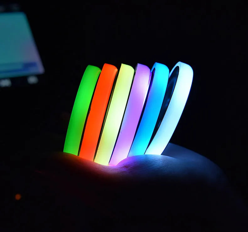 Colourful LED light-up coaster for car cup holder with USB cable.
