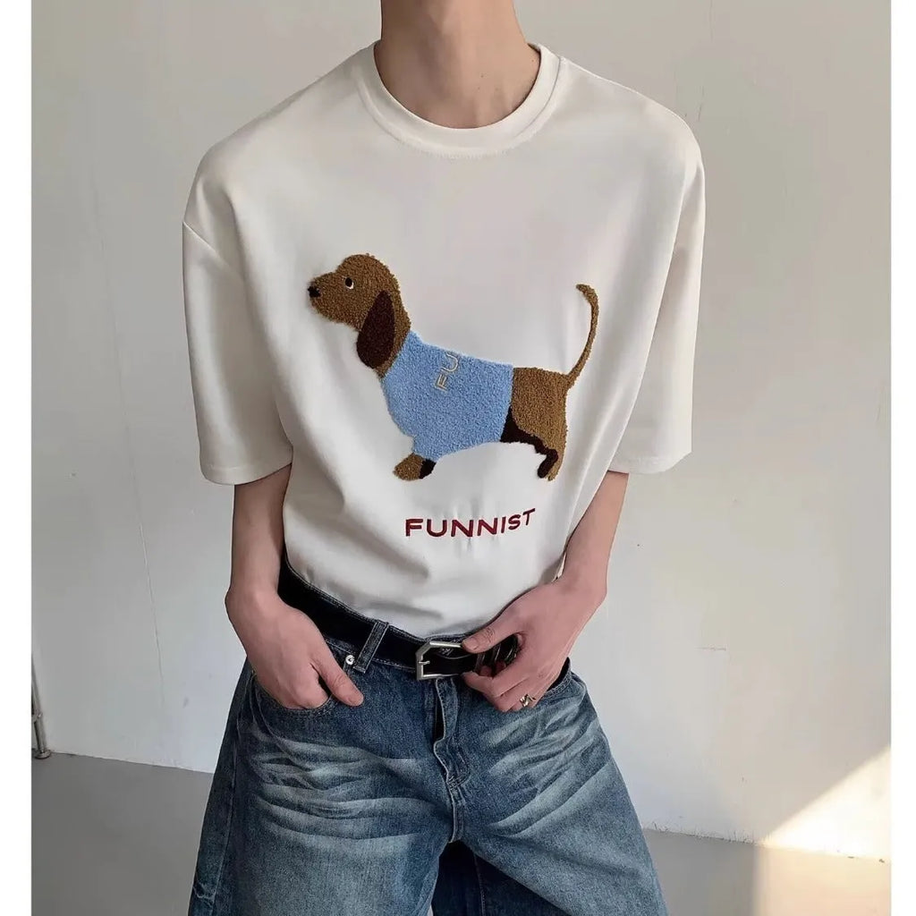 Men's grey cotton t-shirt with embroidered sausage dog holding towel design showing front view