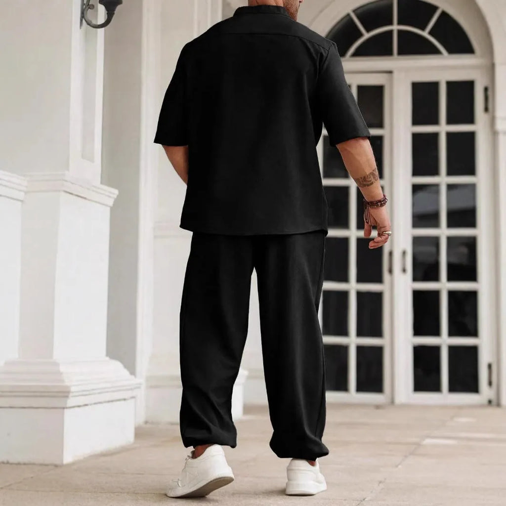 Men's casual apricot cotton linen short-sleeve shirt and trousers set laid flat.