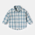 A boy's casual cotton lattice shirt with animal patterns, shown in khaki, light blue, pink, or yellow colour options.