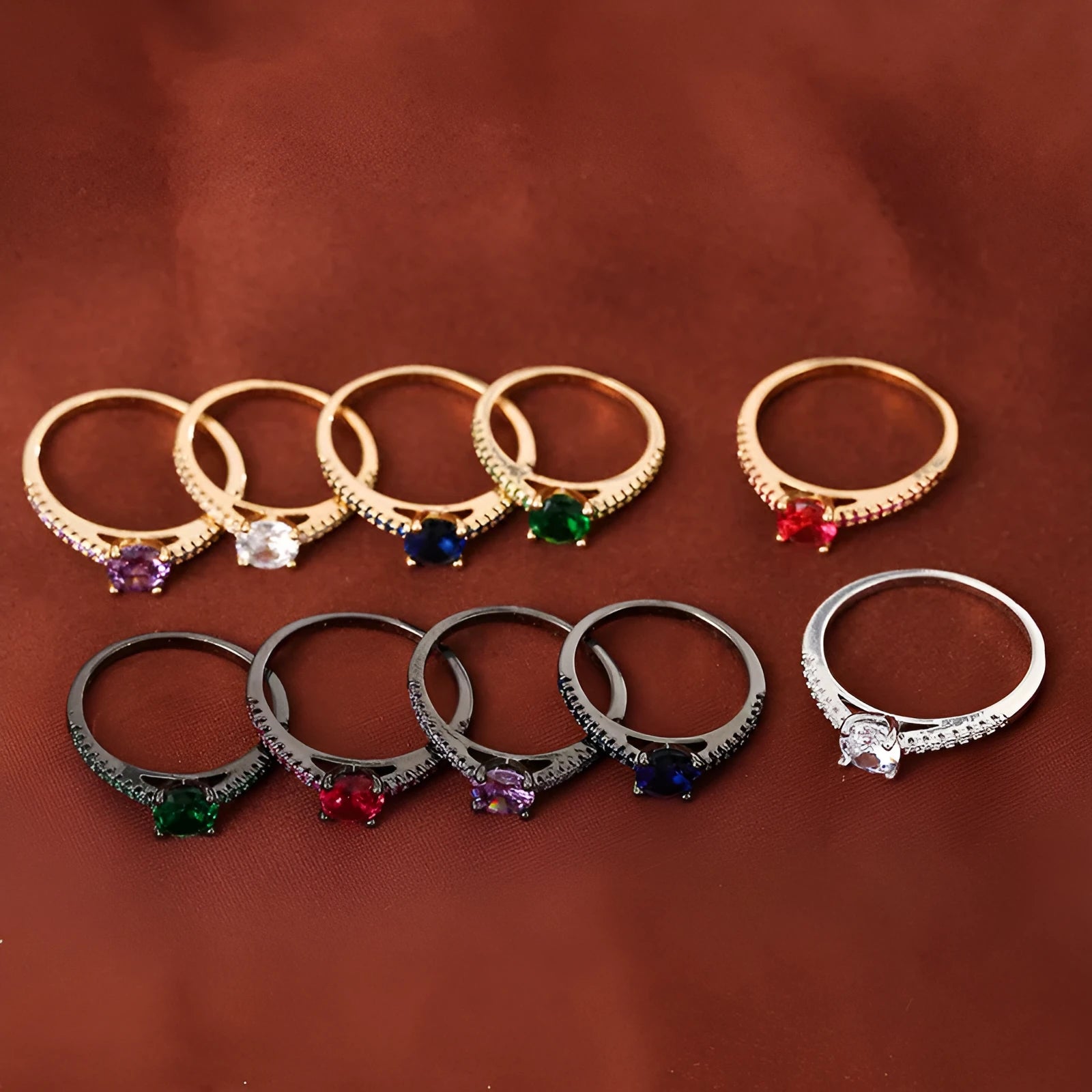 Zircon hexagon ring with geometric design showing electroplated colour options on copper base