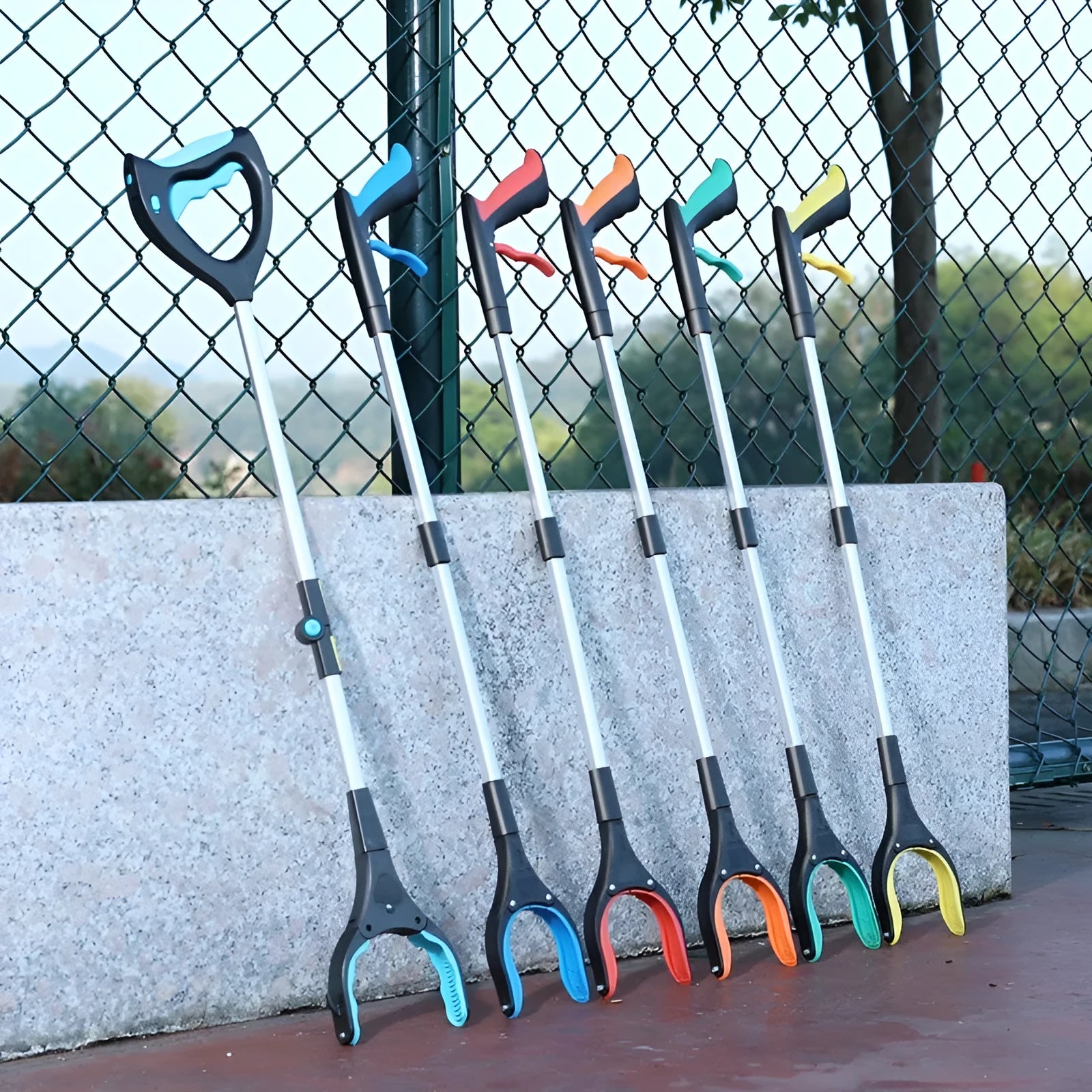Plastic and aluminium alloy sewer pliers for waste collection in blue, green, orange, red, yellow, and blue lighting colours