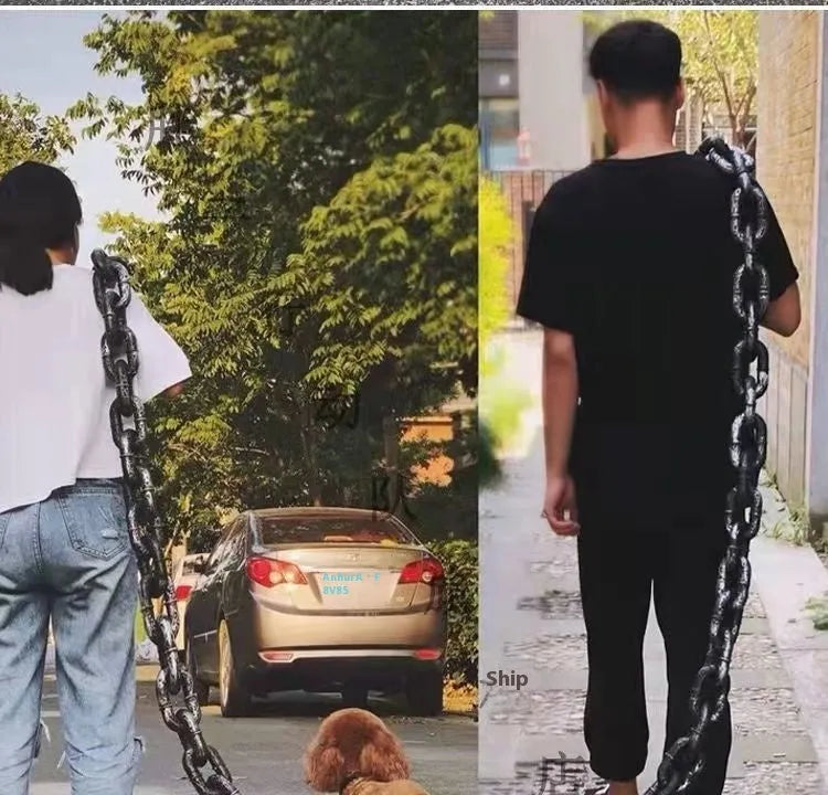 Simulated plastic dog leash prop in bronze colour for video parody content