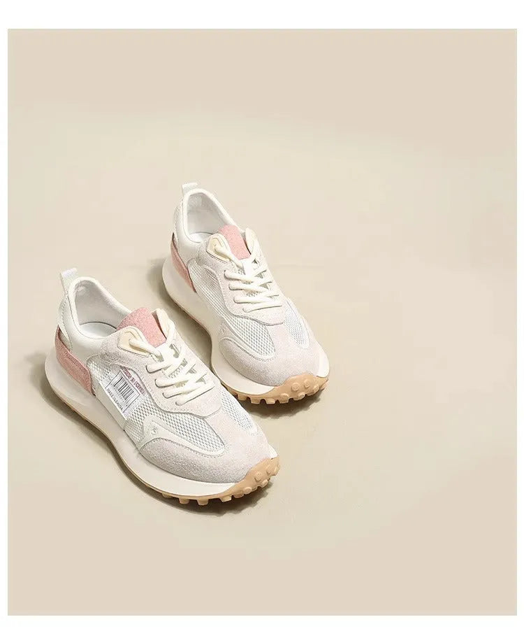 Women's grey and pink retro sneakers with low-top design and round toe