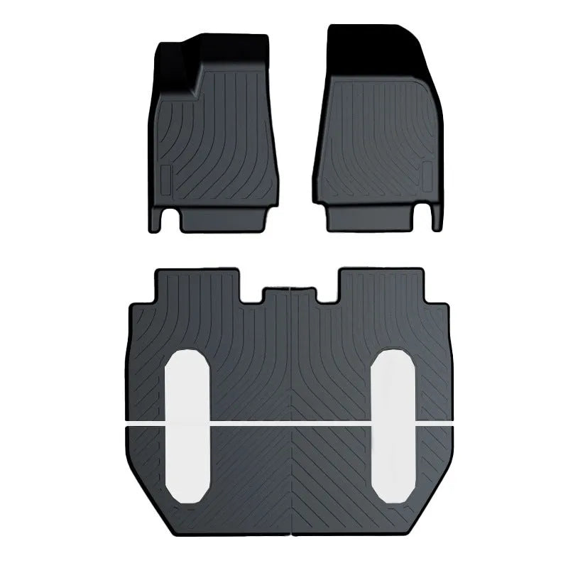 Rubber floor mats with TPE footrests designed for Tesla Model 3, Y, S, and X vehicles.