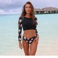 Backless long sleeve nylon swimsuit for women in black print with high elasticity for swimming and wading