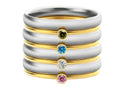 Close-up of a geometric titanium steel ring with an engraved superimposed pattern, shown in a December birthstone colour.