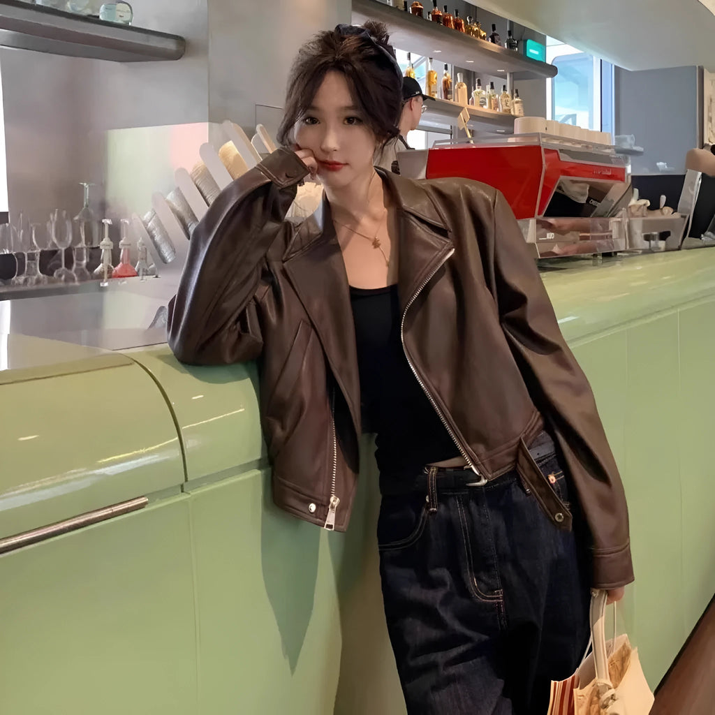 Women's brown retro imitation leather jacket with long sleeves, slim fit, and pockets.