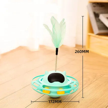 Pink cat stick toy with self-righting tumbler turntable measuring 17cm by 10cm