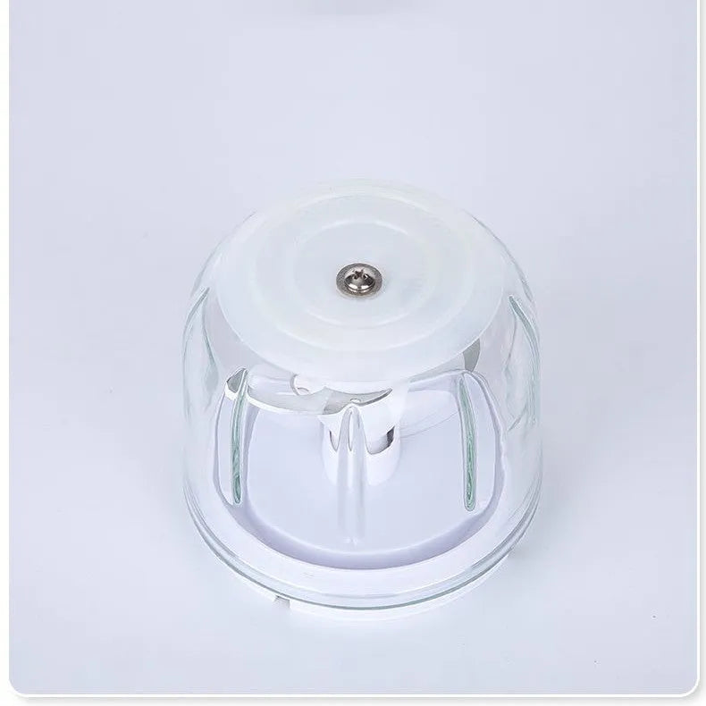 Household small electric sand ice machine in cherry blossom pink with compact 105mm size and 200w power