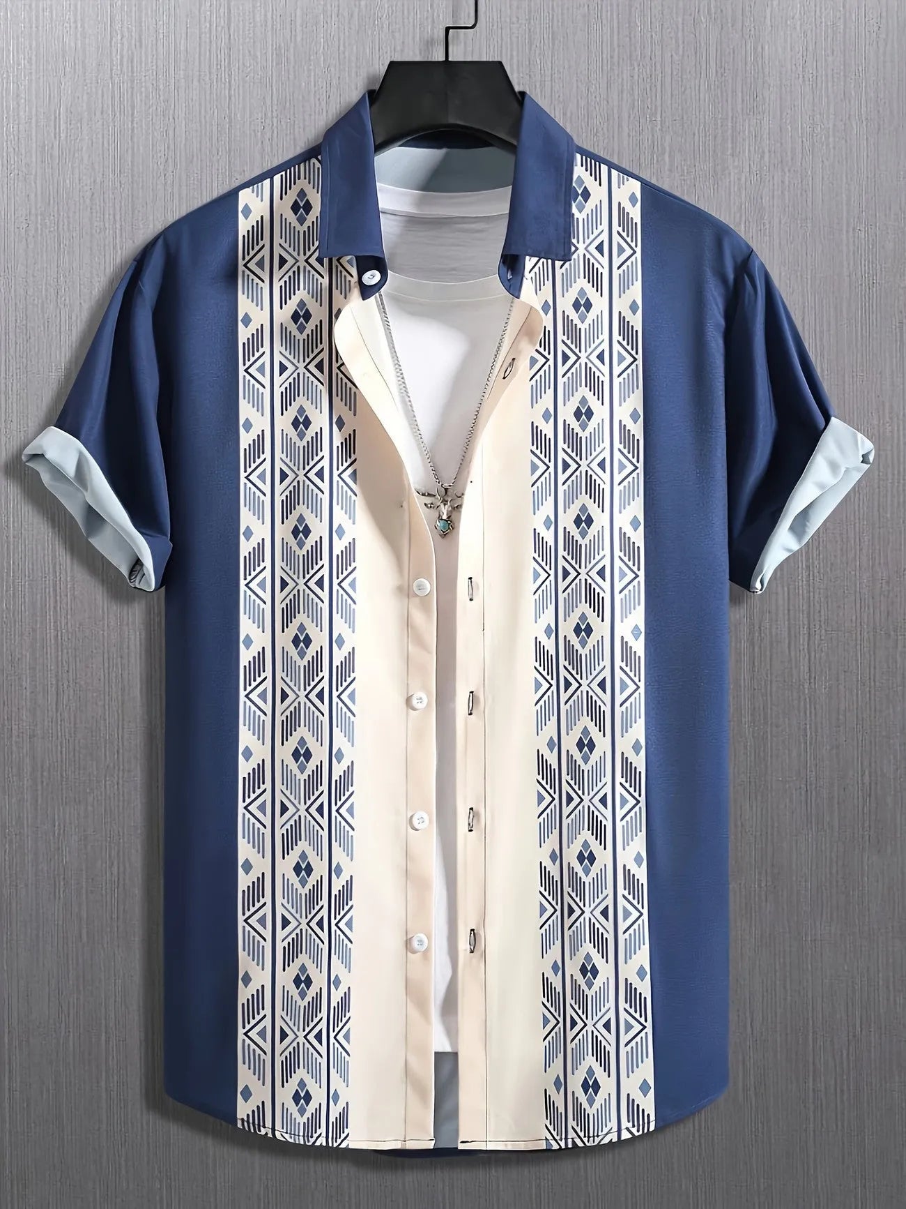 Man wearing a loose fit plaid short sleeve shirt with a contrast colour lapel, cardigan style.