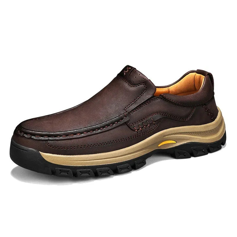 Men's black leather mountaineering shoes with thick rubber soles and round toe design