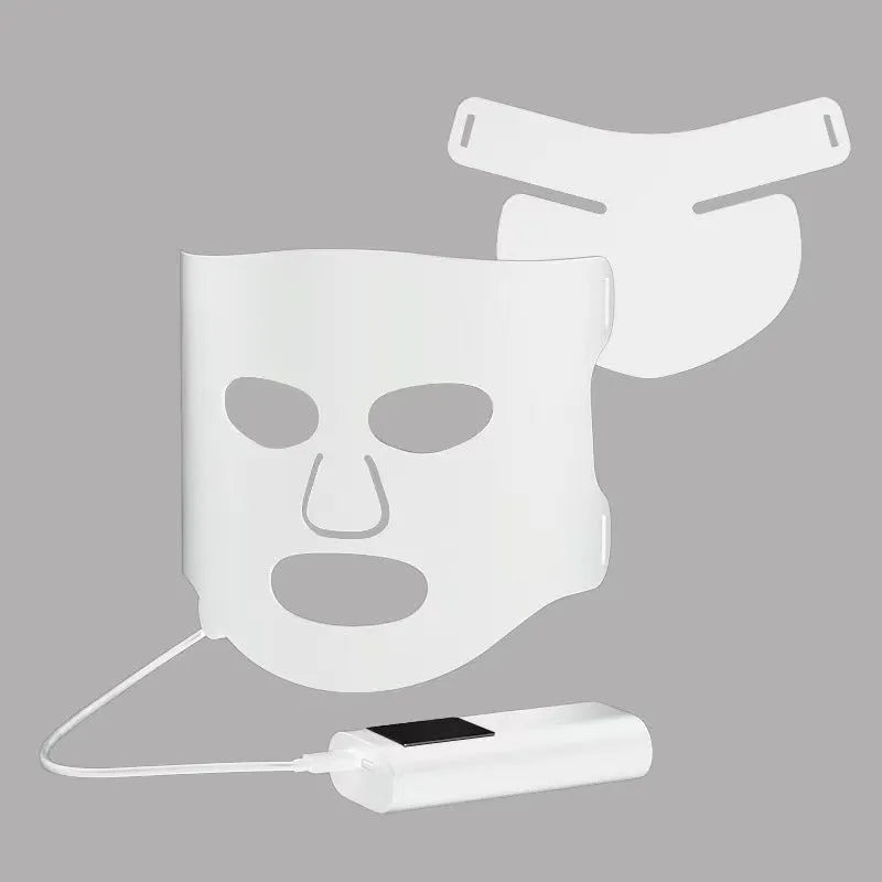 Black and white LED phototherapy face mask with controller showing seven colour light modes