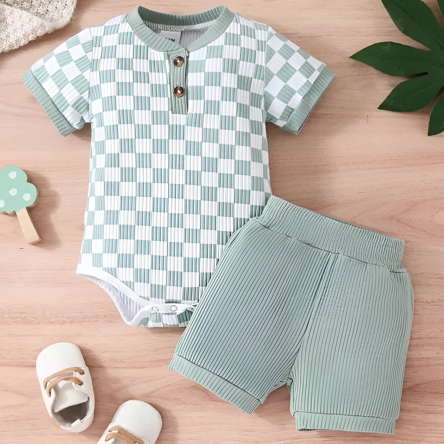 Baby boy cotton two-piece romper set with polo collar and plaid triangle pattern, available in green blue brown black