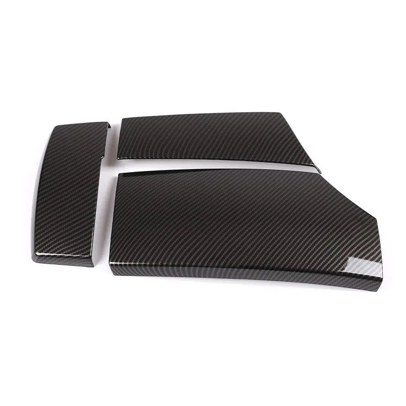 Set of three black ABS plastic armrest box covers with a shiny diagonal carbon fibre weave pattern.