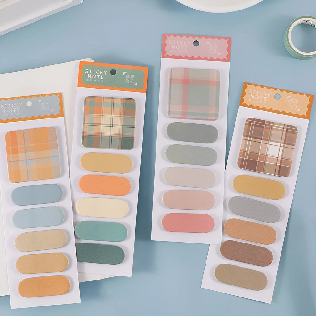 Colourful sticky note memo pad with six designs showing Spring Garden, Twilight Coast, and Blueberry Night colour options