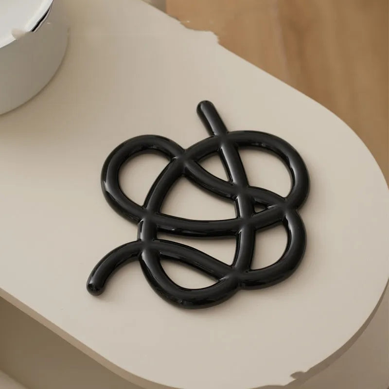 Ceramic heat proof mat in modern simplicity design with irregular shape